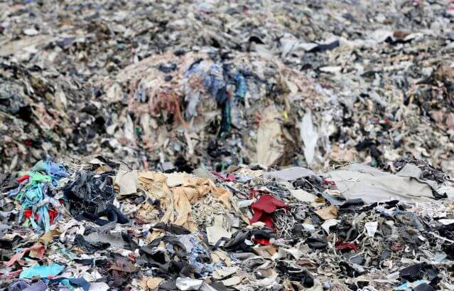 A landfill full of textile waste