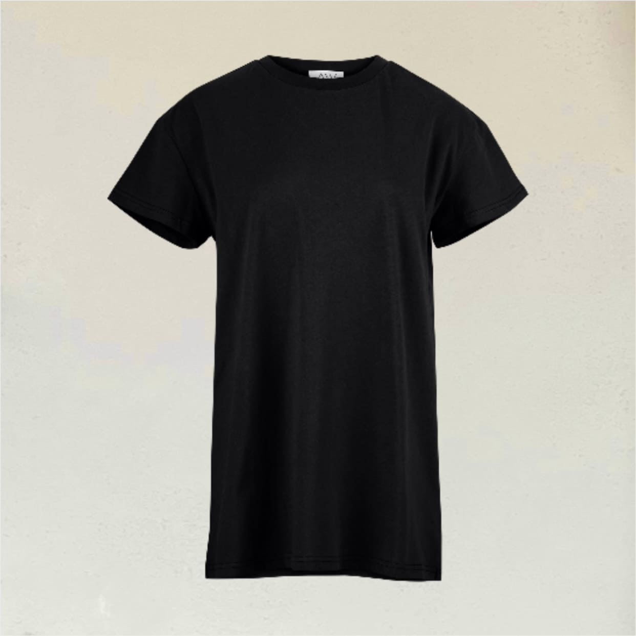 Black T-Shirt in front of beige background